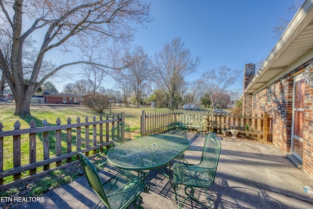 view of patio with outdoor dining area