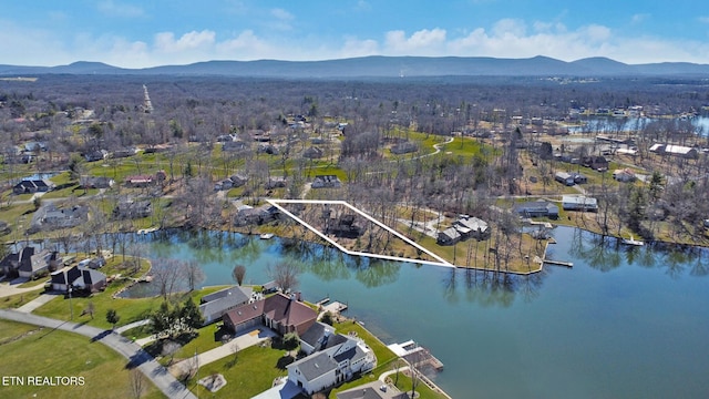 2024 Cravens Dr, Crossville, TN 38572 - aerial view of property and surrounding area featuring a water and mountain view, property parcel outlined, and nearby suburban area