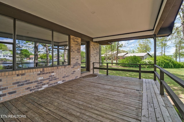 2024 Cravens Dr, Crossville, TN 38572 - wooden terrace featuring a lawn and a water view