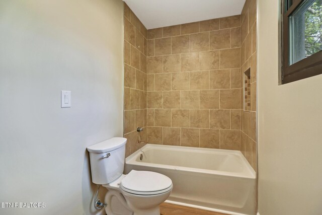2024 Cravens Dr, Crossville, TN 38572 - bathroom with toilet and shower / washtub combination