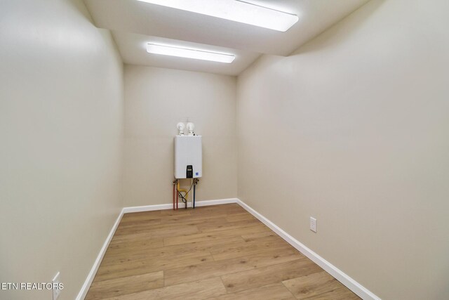 2024 Cravens Dr, Crossville, TN 38572 - spare room with light wood-type flooring and baseboards