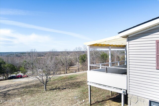 view of yard featuring a sunroom