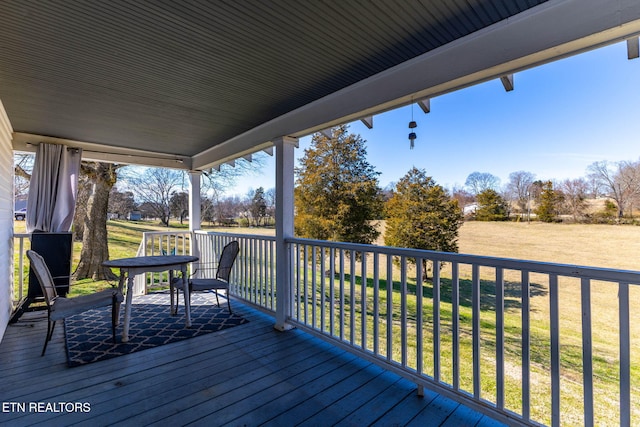 deck featuring a yard