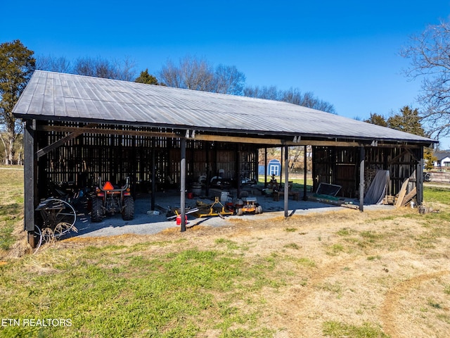 exterior space featuring an outbuilding