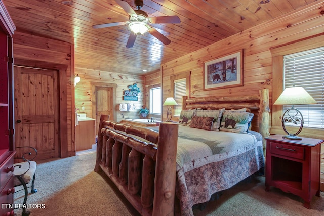 bedroom with carpet floors, wooden ceiling, and wood walls