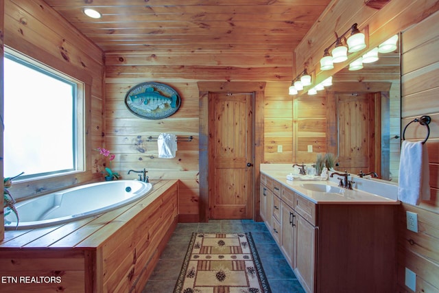 bathroom featuring double vanity, wooden ceiling, a sink, and a bath