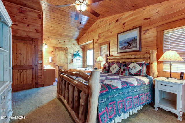 bedroom with lofted ceiling, wood ceiling, carpet flooring, and wood walls