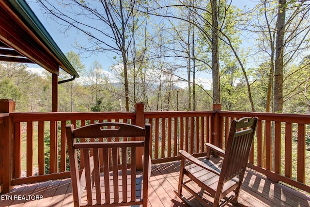 deck with a view of trees