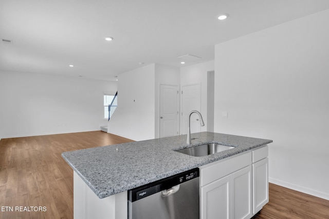 943 Utopia Ln, Knoxville, TN 37932 - kitchen featuring stainless steel dishwasher, a sink, a center island with sink, white cabinets, and light stone countertops