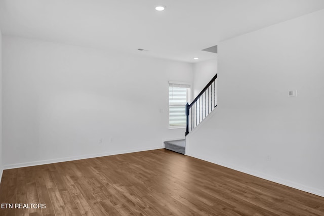 943 Utopia Ln, Knoxville, TN 37932 - spare room featuring stairway, wood finished floors, recessed lighting, and baseboards