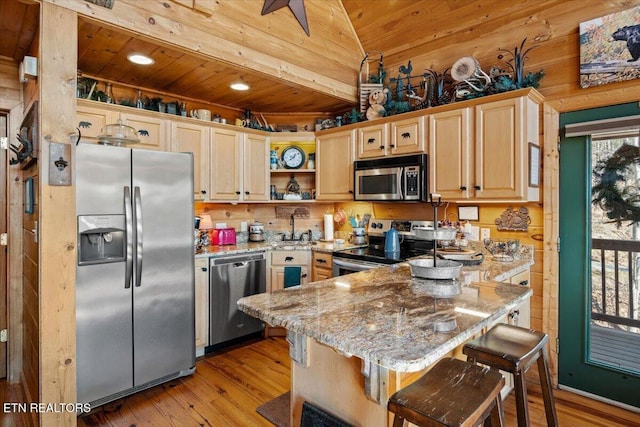 kitchen with light stone counters, a peninsula, wood ceiling, appliances with stainless steel finishes, and open shelves