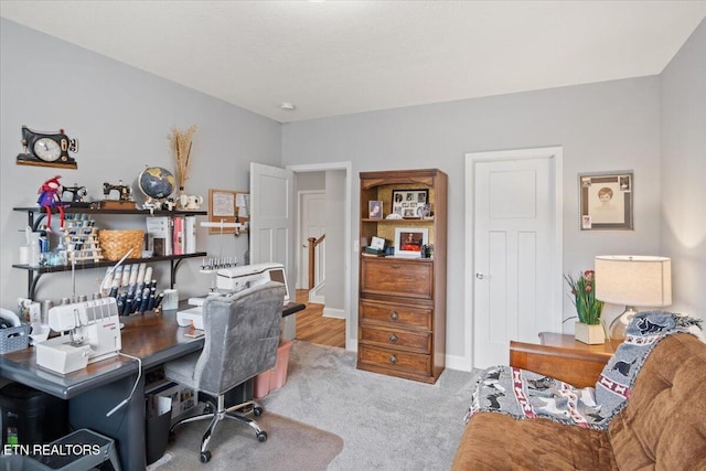 home office with carpet flooring and baseboards