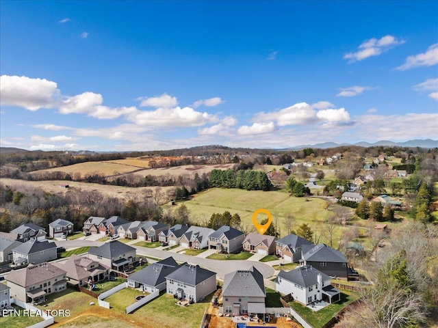 aerial view with a residential view and a mountain view