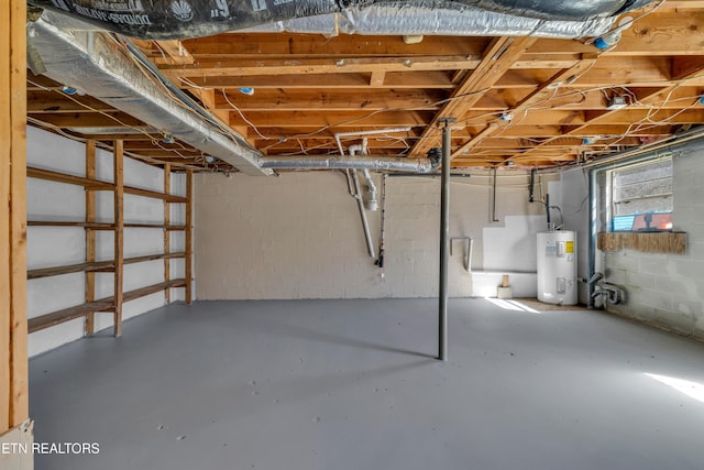 basement featuring electric water heater