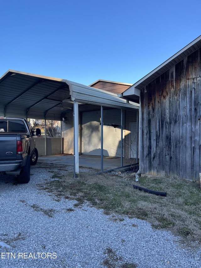 view of parking featuring a carport