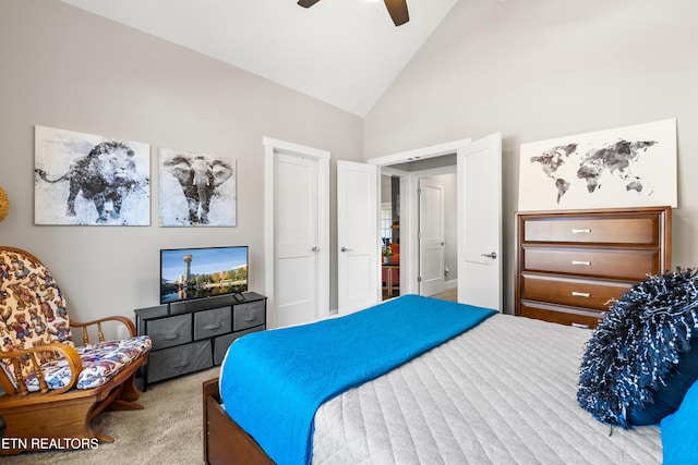 carpeted bedroom featuring high vaulted ceiling and ceiling fan