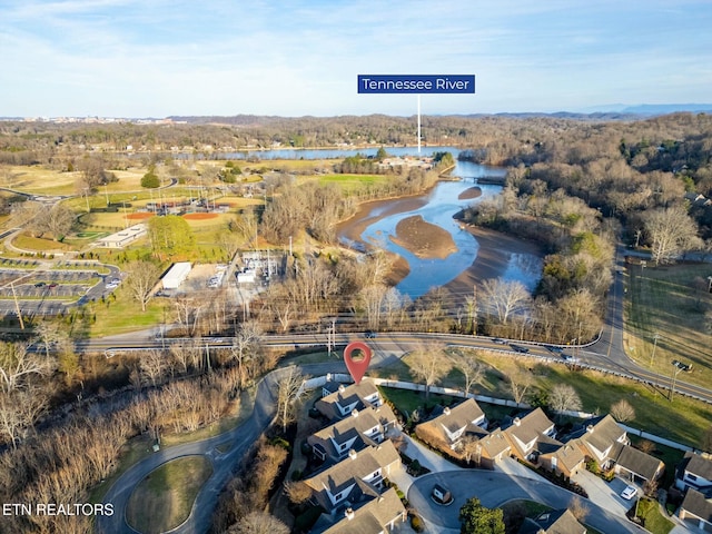 drone / aerial view with a water view