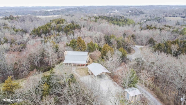 drone / aerial view with a forest view