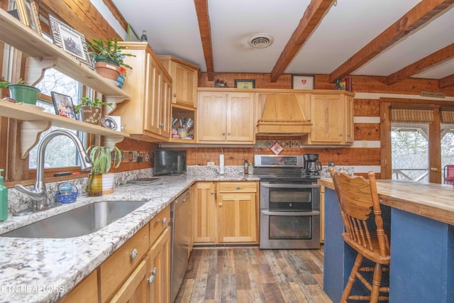 kitchen featuring premium range hood, a sink, visible vents, appliances with stainless steel finishes, and open shelves