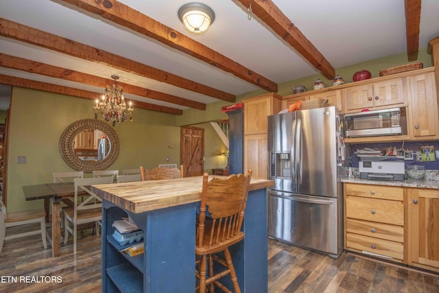 kitchen with a center island, dark wood-style flooring, stainless steel appliances, butcher block countertops, and a kitchen bar