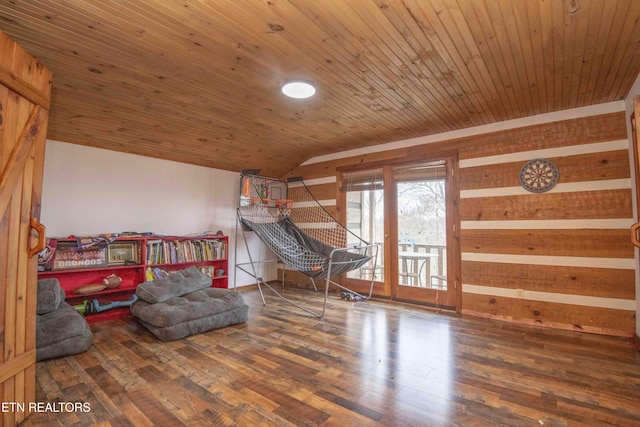 recreation room featuring lofted ceiling, wood ceiling, and wood finished floors