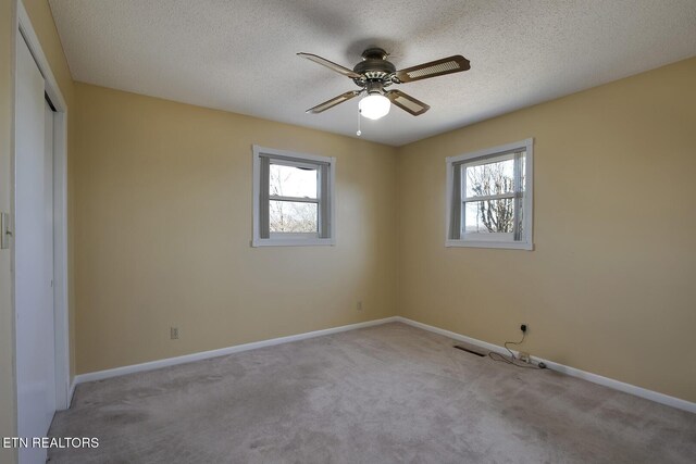 610 Hudson St, Athens, TN 37303 - spare room featuring carpet, a wealth of natural light, and baseboards