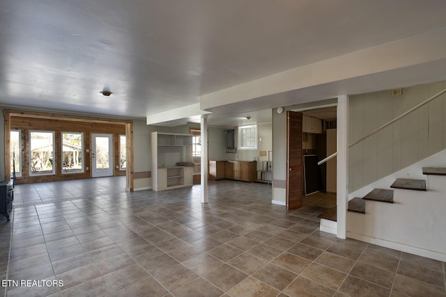 610 Hudson St, Athens, TN 37303 - unfurnished living room with tile patterned flooring, baseboards, and stairs
