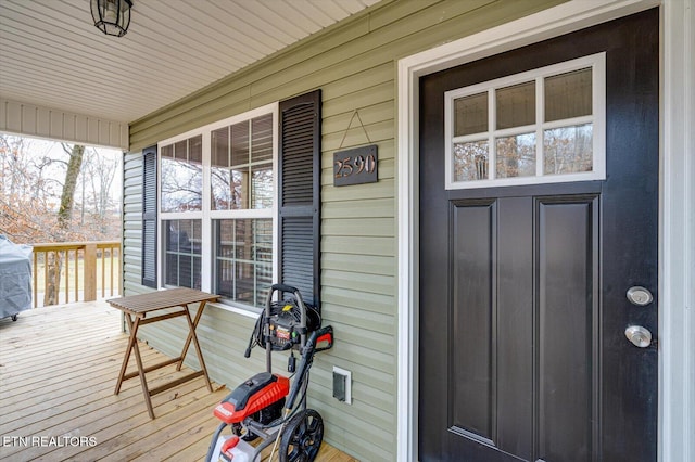 entrance to property with covered porch