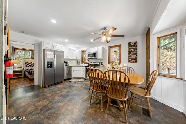 dining room featuring a ceiling fan and recessed lighting