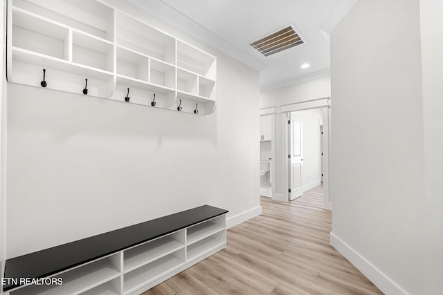 mudroom featuring recessed lighting, baseboards, visible vents, and light wood finished floors