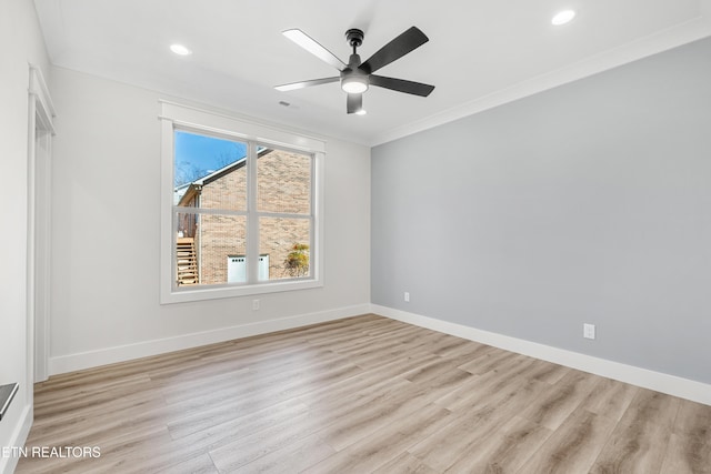 empty room with a ceiling fan, baseboards, light wood-style flooring, recessed lighting, and ornamental molding