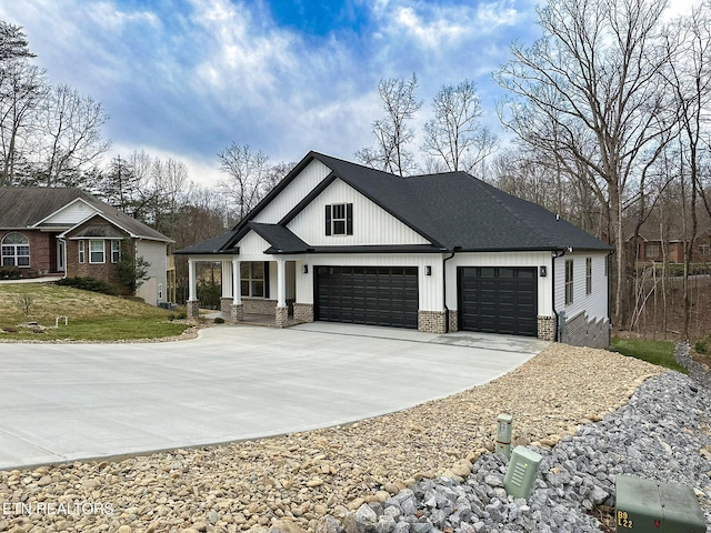 modern farmhouse with brick siding, concrete driveway, an attached garage, and a shingled roof