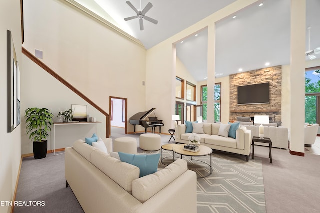 living room featuring high vaulted ceiling, visible vents, ceiling fan, and carpet