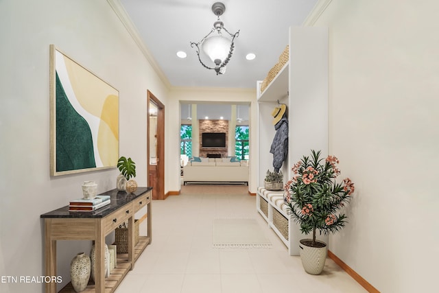 corridor featuring recessed lighting, baseboards, and ornamental molding