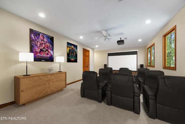 cinema room featuring baseboards, a ceiling fan, recessed lighting, and light colored carpet