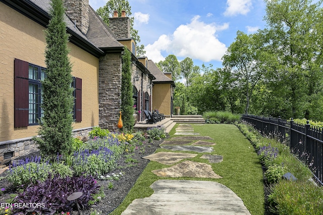 view of yard featuring fence