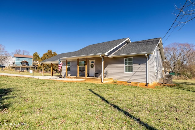 ranch-style home with crawl space, covered porch, roof with shingles, and a front lawn