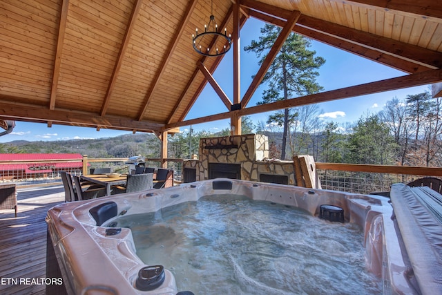 exterior space with a hot tub