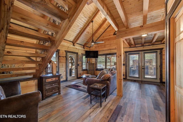 living room with french doors, wood walls, wooden ceiling, and hardwood / wood-style floors