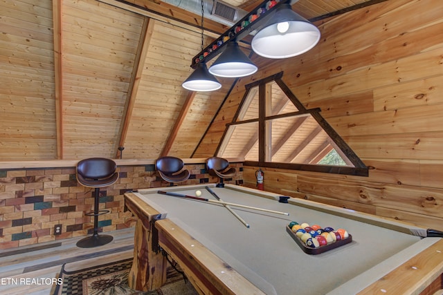 recreation room featuring wooden ceiling, vaulted ceiling with beams, wooden walls, and billiards