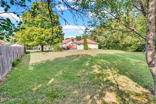 view of yard with fence