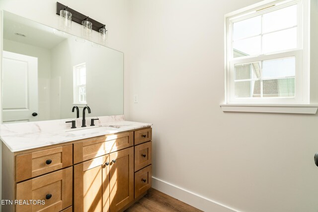 1229 N Main St, Sweetwater, TN 37874 - bathroom featuring baseboards, wood finished floors, and vanity
