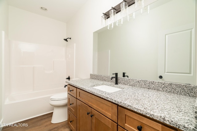 1229 N Main St, Sweetwater, TN 37874 - full bathroom featuring vanity,  shower combination, toilet, and wood finished floors