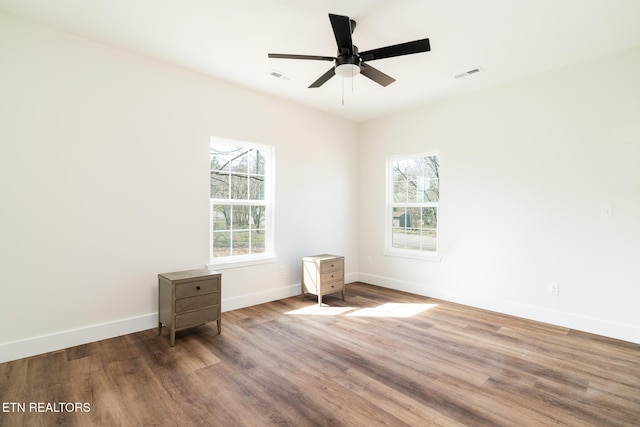 1229 N Main St, Sweetwater, TN 37874 - unfurnished room featuring visible vents, baseboards, and wood finished floors
