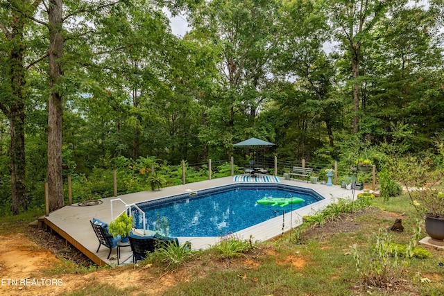 outdoor pool with a patio