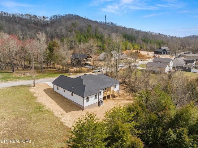 drone / aerial view with a forest view
