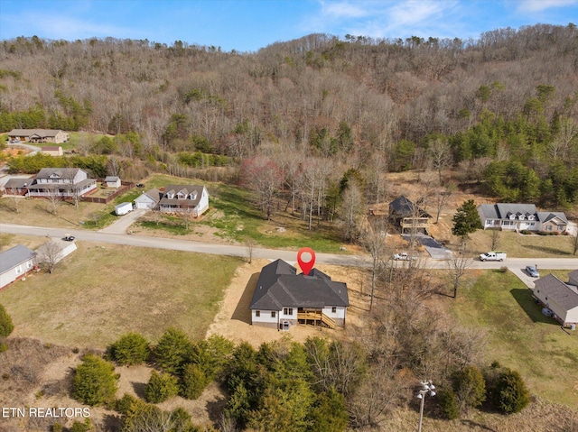 drone / aerial view with a forest view