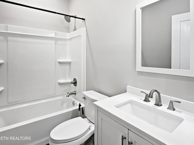 full bath with toilet,  shower combination, and vanity