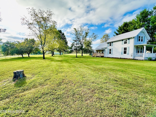 view of yard featuring a porch