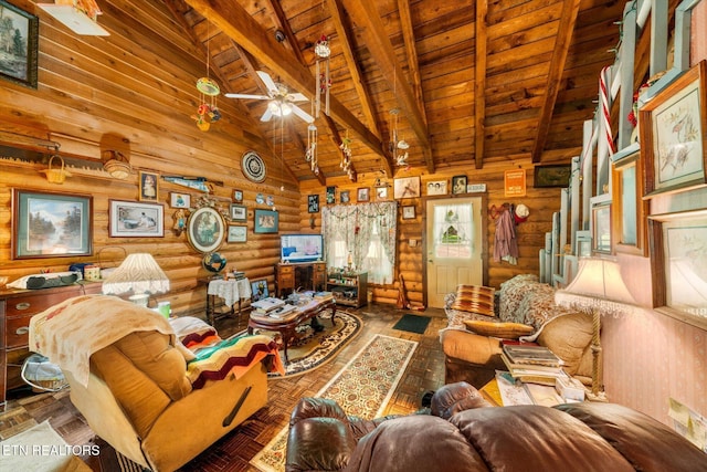 living area with rustic walls, a ceiling fan, wood ceiling, beamed ceiling, and high vaulted ceiling